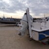 2023 Blue Wave 1900 STL fishing boat with outboard motor on trailer.